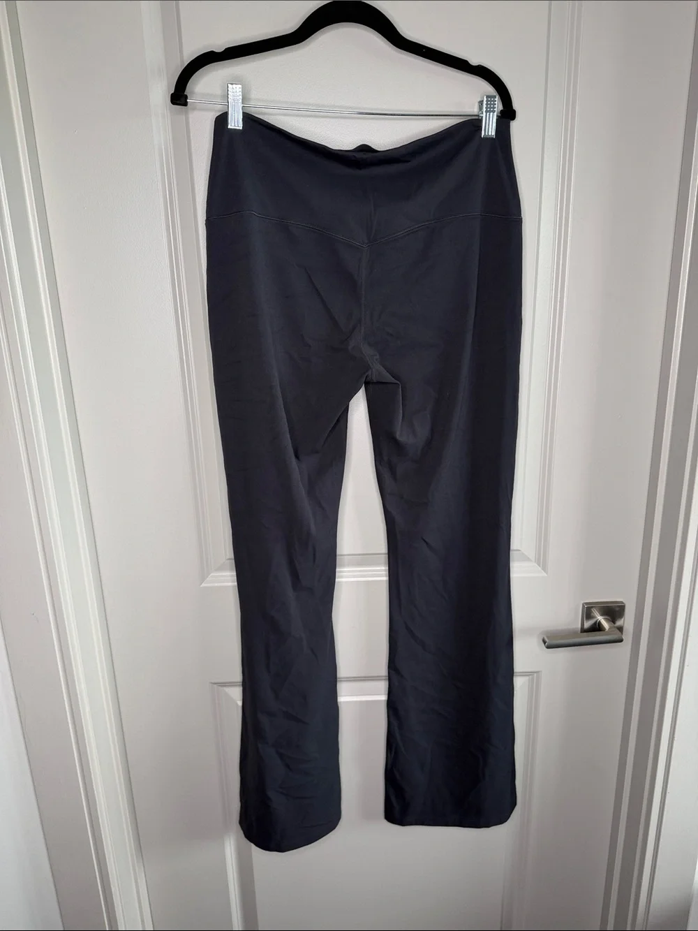 Nike Black Flared Performance Leggings with White Swoosh